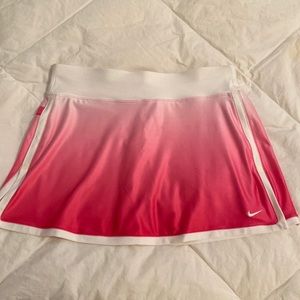 Nike tennis skort, pink ombre with smooth waistband, size medium (8-10).